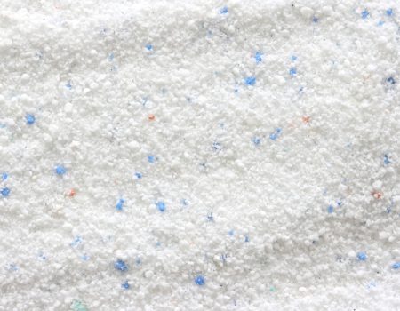 Close up of washing powder with blue granules